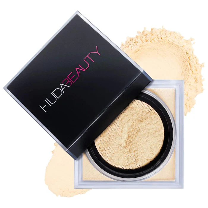 HUDA BEAUTY Easy Bake Blurring Loose Baking & Setting Powder – Banana Bread – light, medium, and tan skin tones. golden undertones brighten and disguise under-eye darkness.
